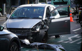 A damaged car was seen after police cars swarmed central Auckland.