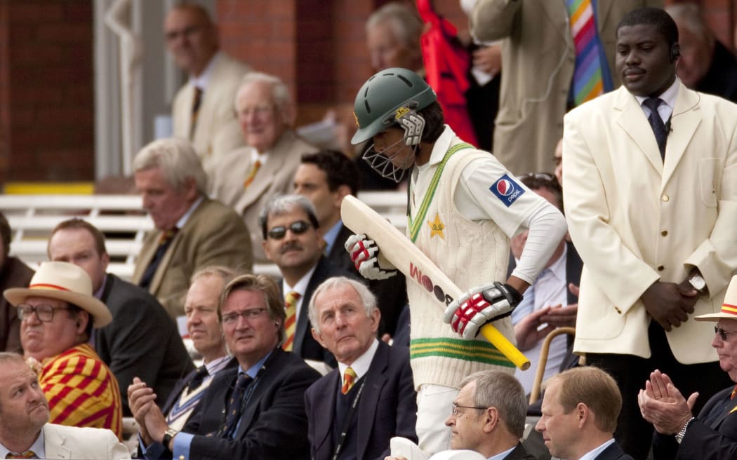 Mohammad Amir heads out to bat in the 2010 Lord's test against England.