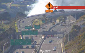 A bus fire has blocked a southbound lane between the Mungavin Interchange and the State Highway 1 and State Highway 59 merge.