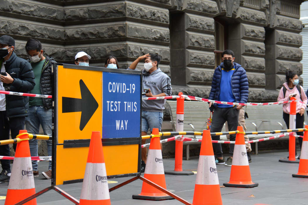 People queue for a Covid-19 PCR test in Melbourne, Australia on 8 January, 2022.