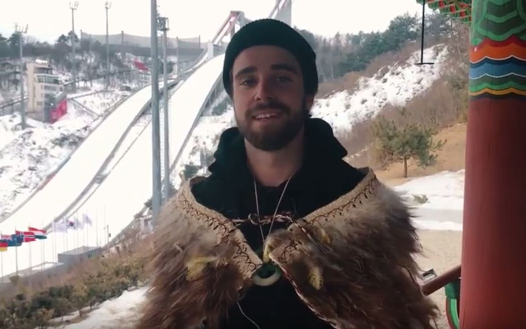 Beau-James Wells in the New Zealand team kakahu (cloak) which is worn only by the flagbearer of New Zealand Olympic teams.