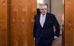 Australian Prime Minister Scott Morrison arrives to welcome Indonesian President Joko Widodo ahead of signing the official visitors book at Parliament House in Canberra on February 10, 2020.