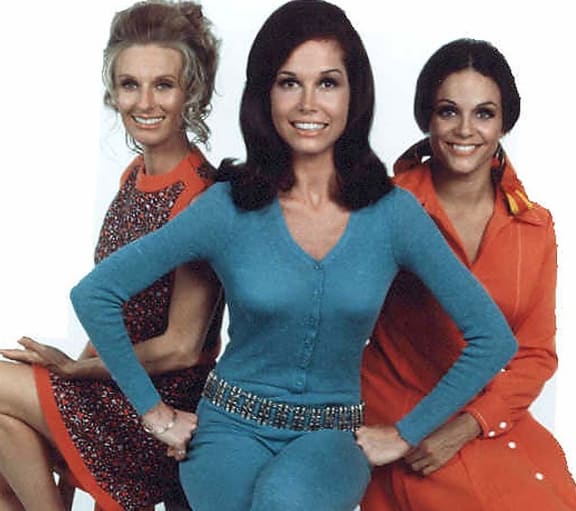 This undated photo shows US actress Mary Tyler Moore (C) with Cloris Leachman (L) and Valerie Harper (R) in a scene from the US television show," The Mary Tyler Moore Show".