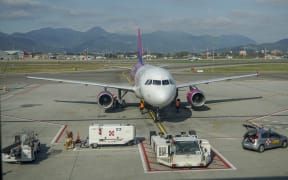 A plane at Milan Bergamo airport in Milan , Italy.