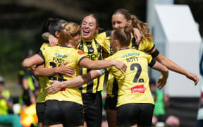 Wellington Phoenix players celebrate a goal during their 7-0 win over Sydney FC in a A-League women's match at Porirua Park, 20 December 2025. © Copyright image by Marty Melville / www.photosport.nz