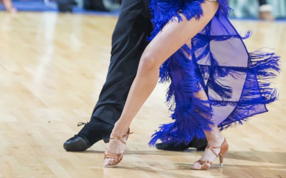 Dance competitors perform a Latin American dance,  Belarus, 2017.