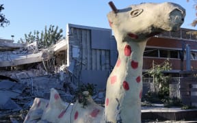 A damaged school building is pictured in Ramat Gan, near Tel Aviv, on December 19, 2024, after the campus was struck by debris from the reported interception of a projectile from Yemen. (Photo by Jack GUEZ / AFP)