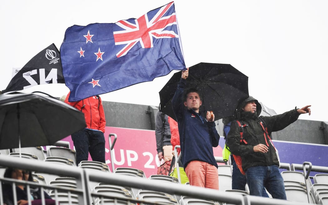 Fans and supporters. New Zealand Black Caps v India. ICC Cricket World Cup semi final match. Old Trafford Cricket ground, Manchester UK.
