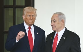 US President Donald Trump welcomes Israeli Prime Minister Benjamin Netanyahu to the White House in Washington, DC, on April 7, 2025. Israeli Prime Minister Benjamin Netanyahu was in Washington on Monday to meet Donald Trump, whom he will likely ask for a reprieve from US tariffs while seeking further backing on Iran and Gaza. (Photo by Brendan SMIALOWSKI / AFP)