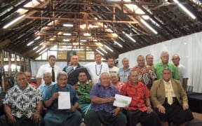 MP Laauli on right (front row) with several matais of Sasina village.