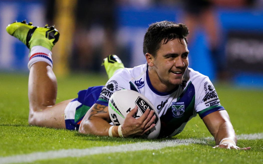 Kodi Nikorima scores for the Warriors during their win over the Penrith Panthers