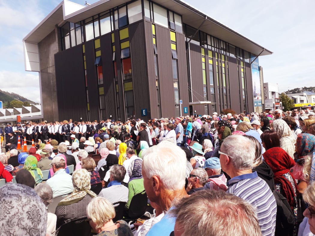A crowd gathered in Nelson for today's Hands Around Nelson's Mosque memorial prayer service in Hardy Street.