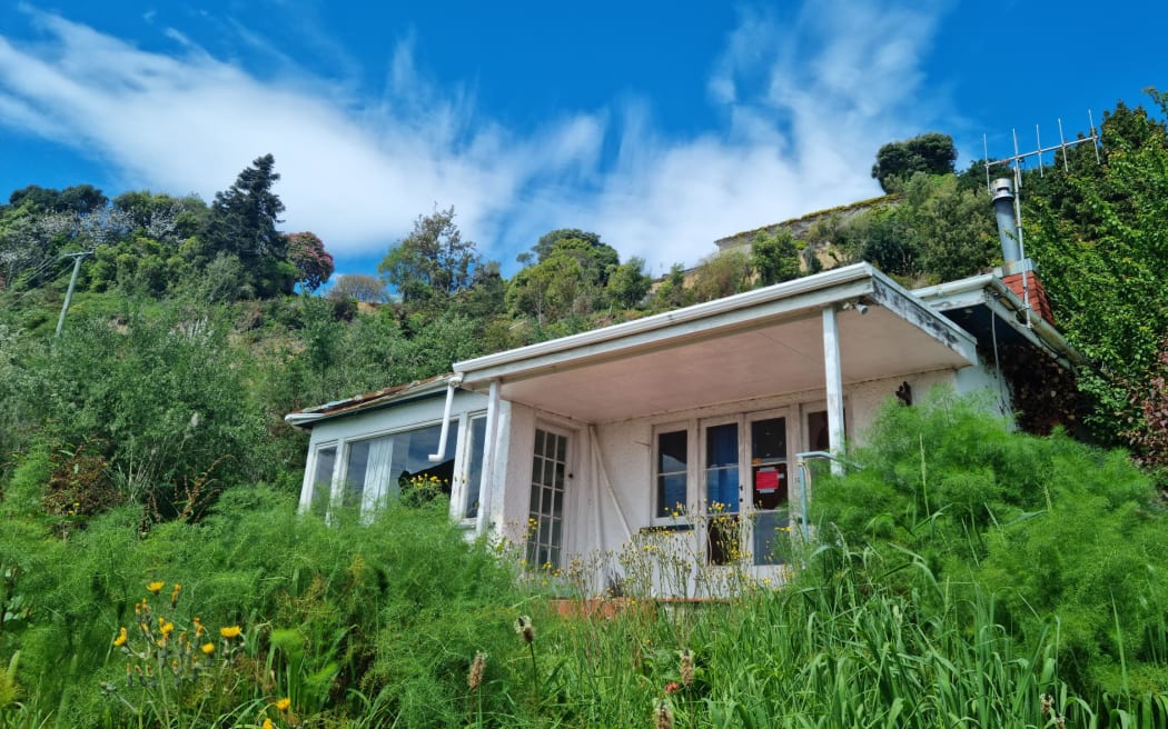 A red stickered home in Nelson, in October 2022, following major floods in the region in August.