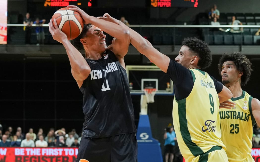 Tall Blacks Flynn Cameron (L) with Australia Jaylin Galloway during the FIBA World Cup Qualifier - New Zealand Tall Blacks v Australia Boomers at TSB Arena, Wellington, on 1 December 2025.