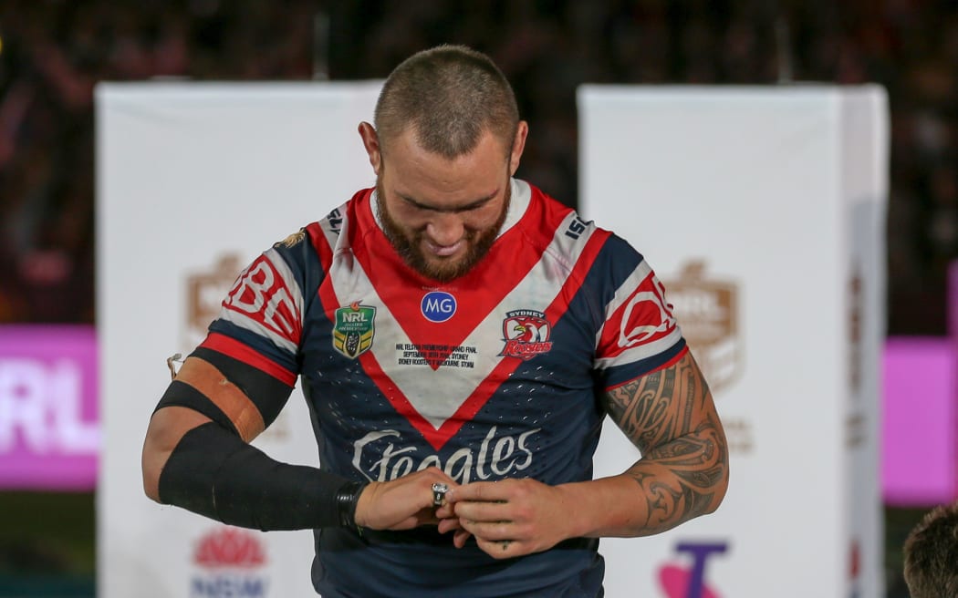 Jared Waerea-Hargreaves looks at his premiership ring.