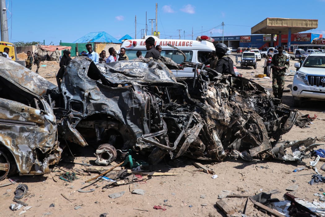 The wreckage of a car that was destroyed during the car bomb attack is seen in Mogadishu.
