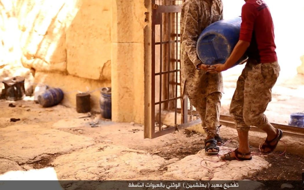 Islamic State has published images of the destruction of the Temple of Baalshamin at the ancient ruins of Palmyra in Syria.