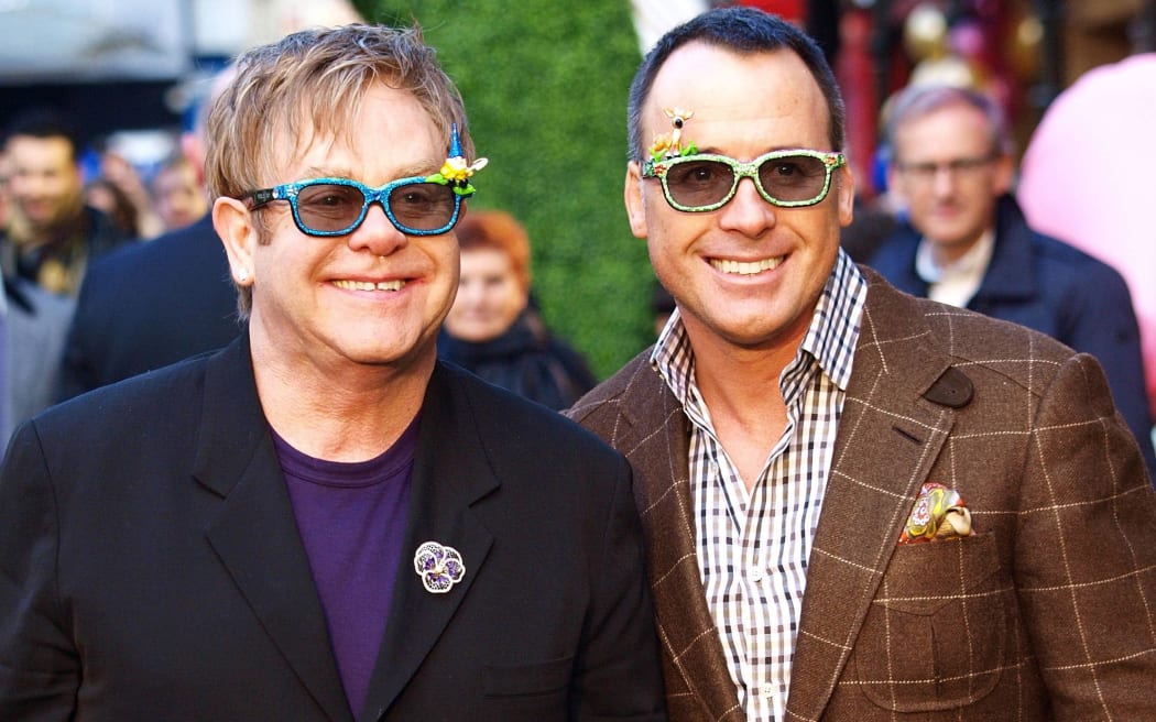 Elton John (L) and his husband David Furnish