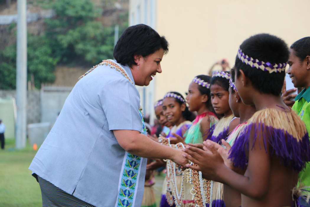 Paula Bennett speaks to children during ceremonies in the Solomon Islands to mark the end of the RAMSI mission.