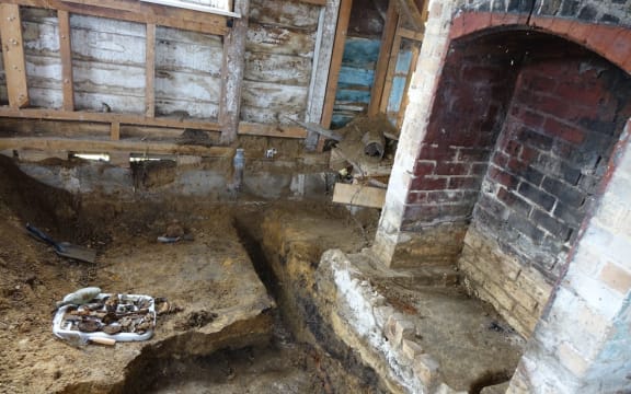 The house featured a back-to-back fireplace.