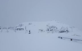 The Crown Ranges turned into a sheet of white this morning after heavy snowfall overnight.
