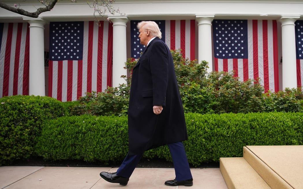 WASHINGTON, DC - APRIL 02: U.S. President Donald Trump departs after signing executive orders imposing tariffs on imported goods during a “Make America Wealthy Again” trade announcement event in the Rose Garden at the White House on April 2, 2025 in Washington, DC. Touting the event as “Liberation Day”, Trump announced sweeping new tariffs targeting goods imported to the U.S. on countries including China, Japan and India.   Andrew Harnik/Getty Images/AFP (Photo by Andrew Harnik / GETTY IMAGES NORTH AMERICA / Getty Images via AFP)