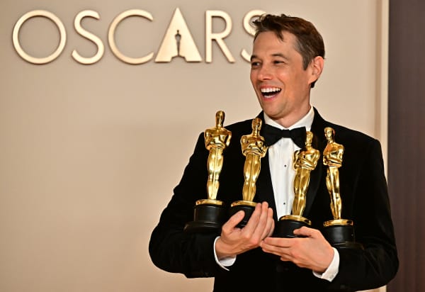 US producer Sean Baker poses in the press room with the Oscars for Best Film Editing, Best Original Screenplay, Best Director and Best Picture for "Anora" during the 97th Annual Academy Awards at the Dolby Theatre in Hollywood, California on March 2, 2025. (Photo by Frederic J. Brown / AFP)