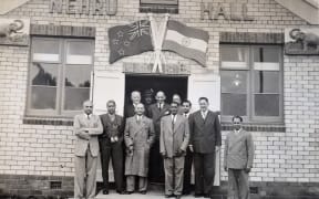 Delegates of the Pukekohe Indian Association stand in front of Nehru Hall, which opened in 1953.