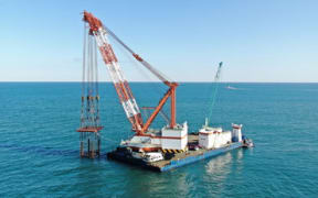 TEPCO installing discharge outlet caisson.