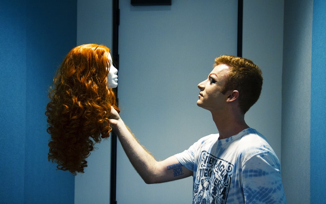 Hamish Russell and his bright orange Rita Hayworth wig.
