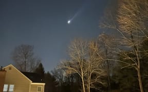 This photo provided by Brian Glenn shows what appears to be multiple drones flying over Bernardsville, New Jersey, on 5 December, 2024.