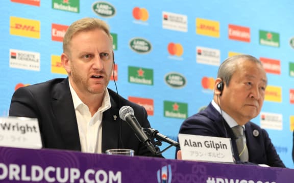 Rugby World Cup tournament director Alan Gilpin (L).