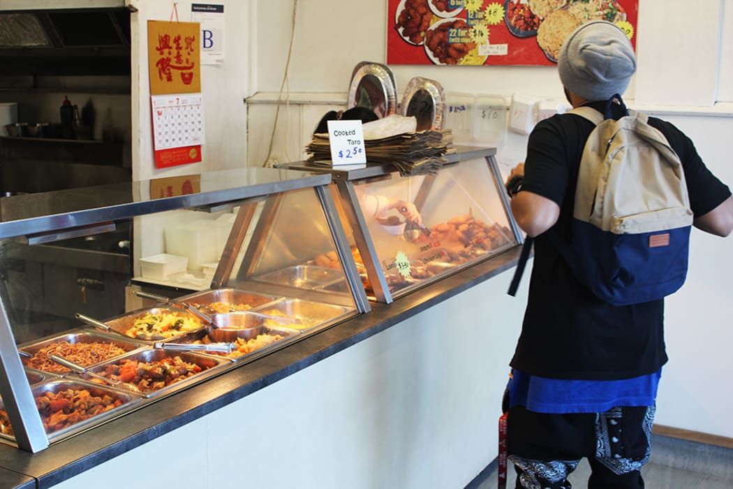 INF says "I like eating, so there’s a spot on Mt Smart Road that’s got real good fried chicken. Ages ago they had Street Fighter machines, and that’s where I stepped up my game".