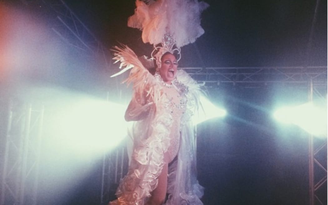 One of the Caluzzi girls performing as part of Literal Fuck's set in 2015.