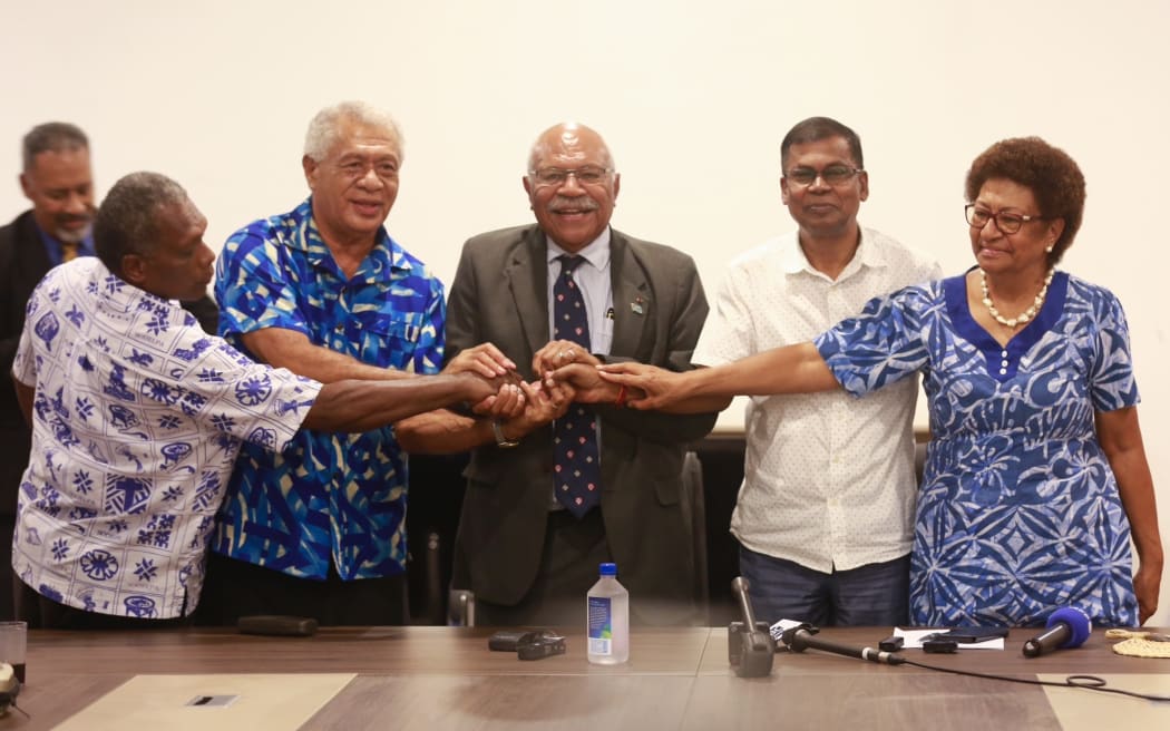 Done deal! Coalition agreement signed - Second from left Sodelpa chief negotiator Anare Jale, People's Alliance leader Sitiveni Rabuka, National Federation Party leader Biman Prasad and Ro Teimumu Kepa former Sodelpa Leader. 20 December 2022