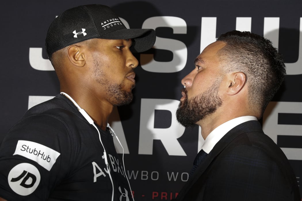 Anthony Joshua (L) and Joseph Parker will go head-to-head in their heavyweight boxing world title showdown in Cardiff this weekend.