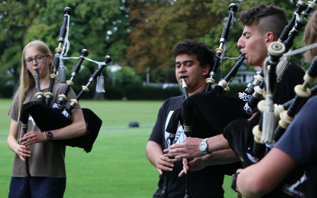 Qwenton McKenzie plays the pipes.