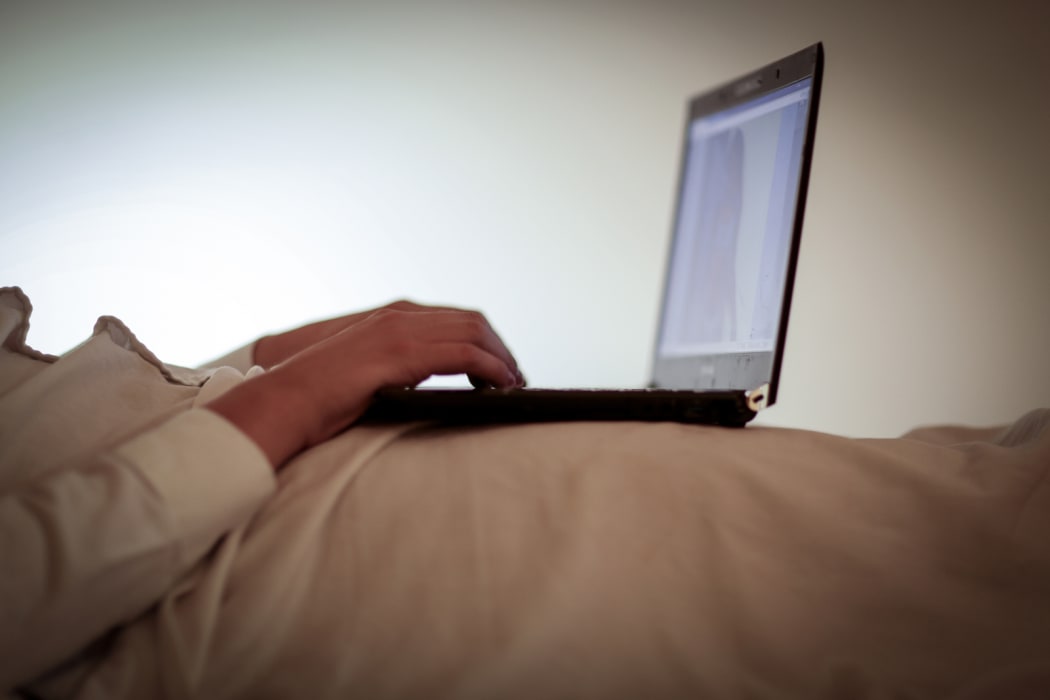 Person watching porn on laptop computer.