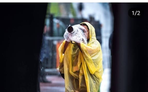 Music photographer Ngamihi Pawa get soaked at Auckland's Mt Smart Sadium