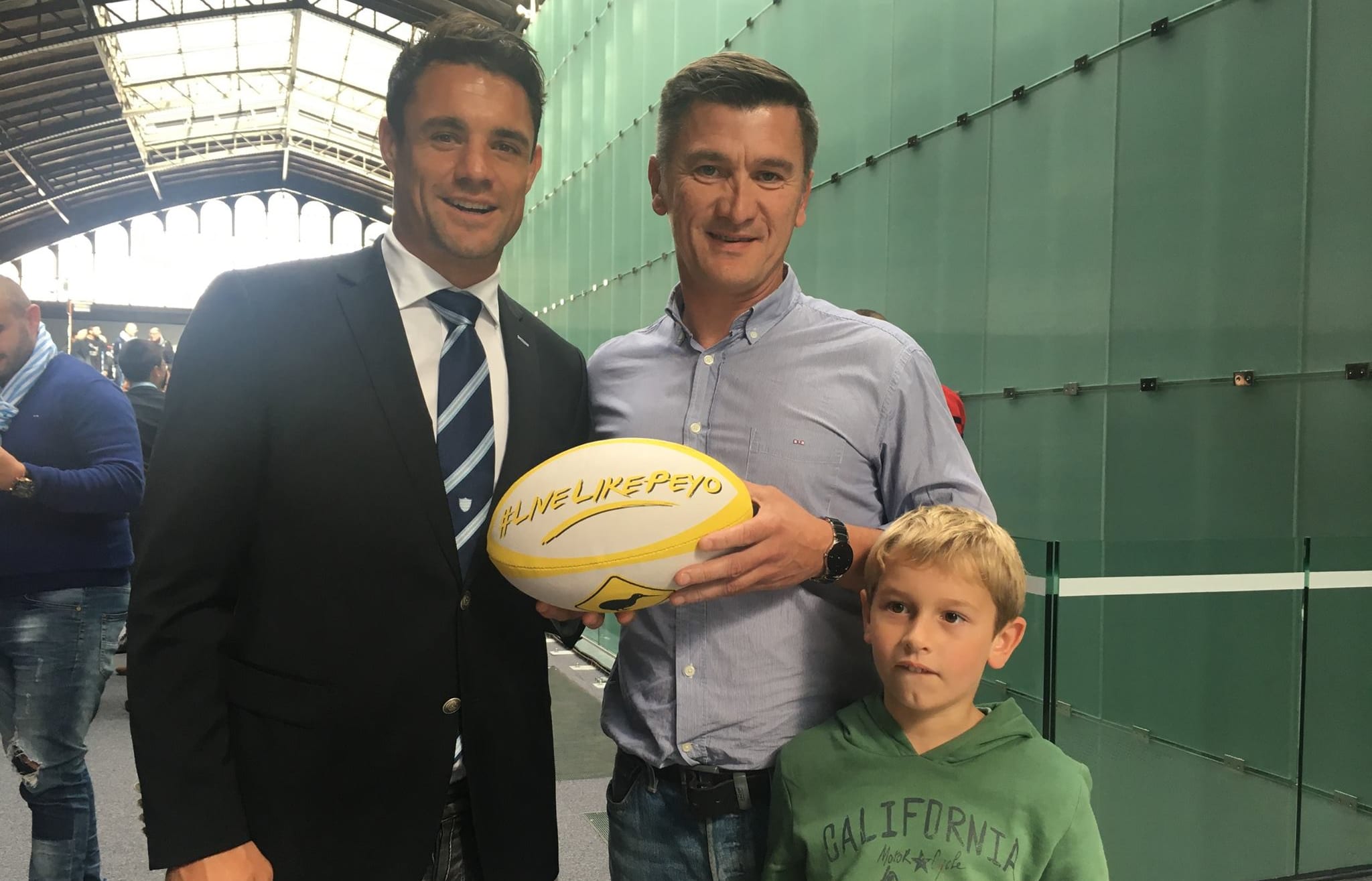 Dan Carter with Peyo's father Oliver, who is organising a memorial rugby match between Peyo's French and Kiwi friends.