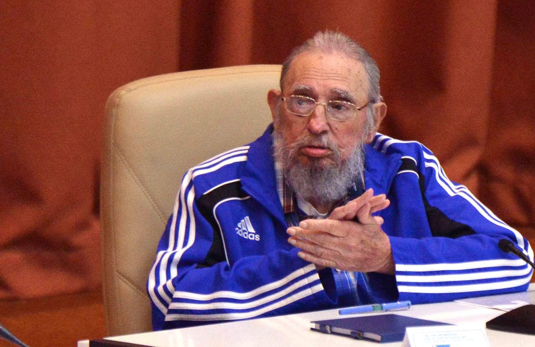 This file handout picture released by Cuban Agency ACN taken on April 19, 2016 shows Cuban Former President Fidel Castro applauding during the closing ceremony of VII Congress of Cuban Communist Party (PCC) at Convention Palace in Havana.