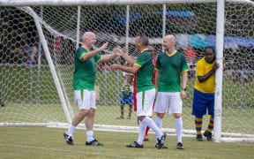 Gianni Infantino celebrates a goal for the FIFA Legends' XI against a Solomon Islands' X1 in Honiara.