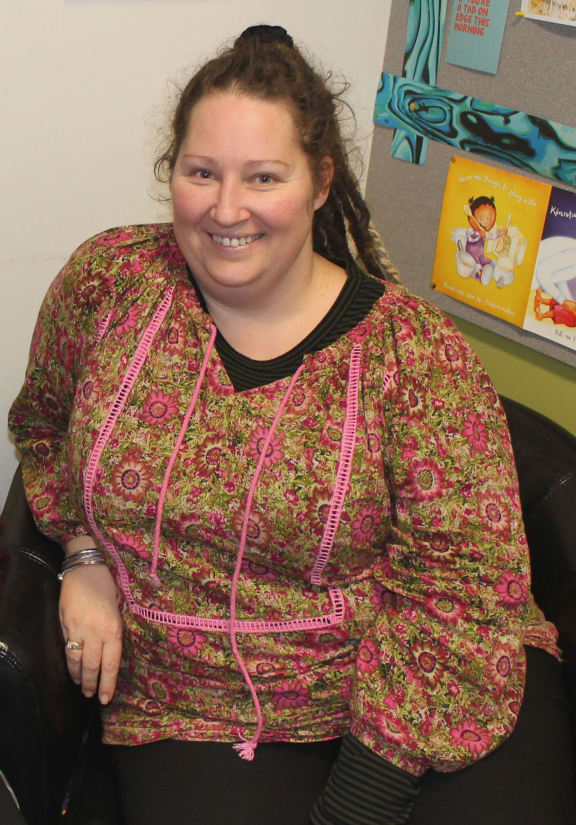 A photo of Tasha Pearce who is a social worker and singer and now a mentor to Courtney Watts