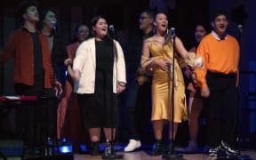 Members of Ka Hao perform with Rob Ruha and the Auckland Philharmonia Orchestra in Auckland Town Hall