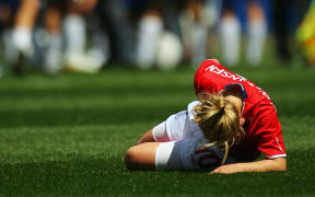 Isobel Christiansen goes down with an injury.