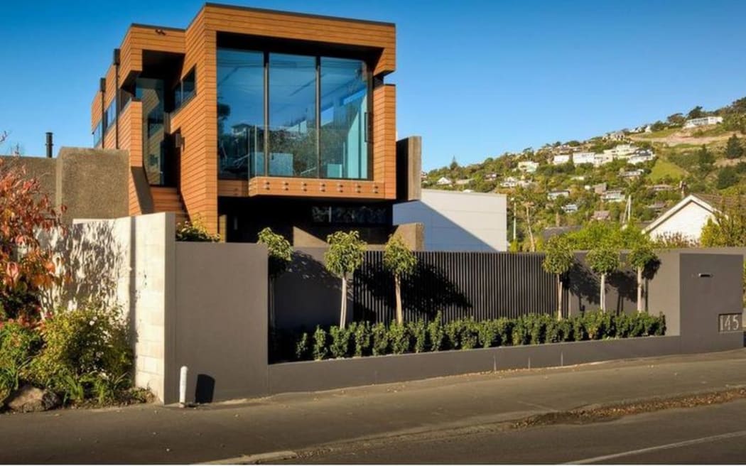 The luxury house at Redcliffs. Owner Pavlos Van Aalst and insurer IAG are in dispute over the rebuild cost.