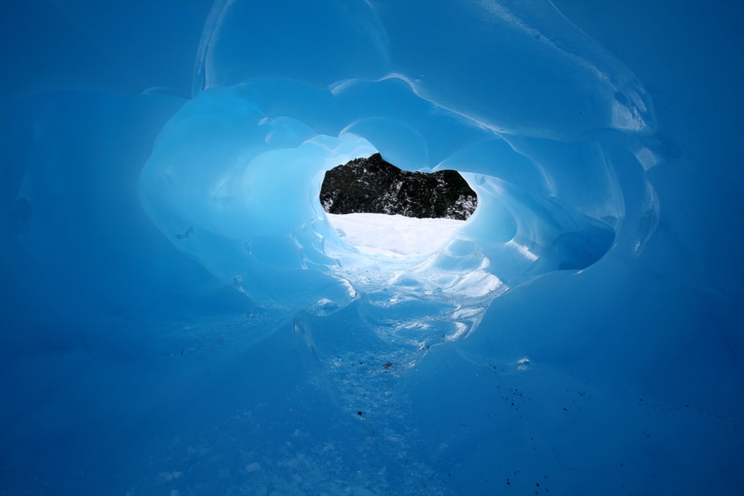 A hole in the ice on Fox Glacier.