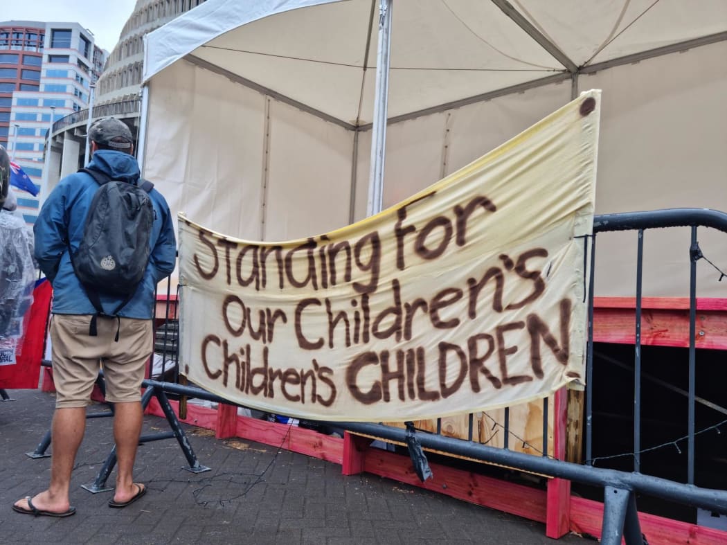 A sign at the protest camp at Parliament.