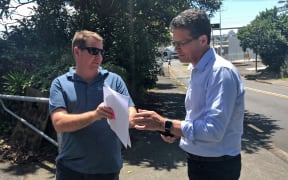 Newsroom co-editor Tim Murphy (right) served with the legal action.