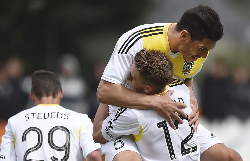 Michael Boxall (L) and Tyler Boyd of the Wellington Phoenix celebrate a goal.